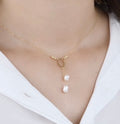 Collier en Or18k avec deux perle naturelle