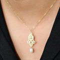Collier khmissa en Or18k avec johra naturelle